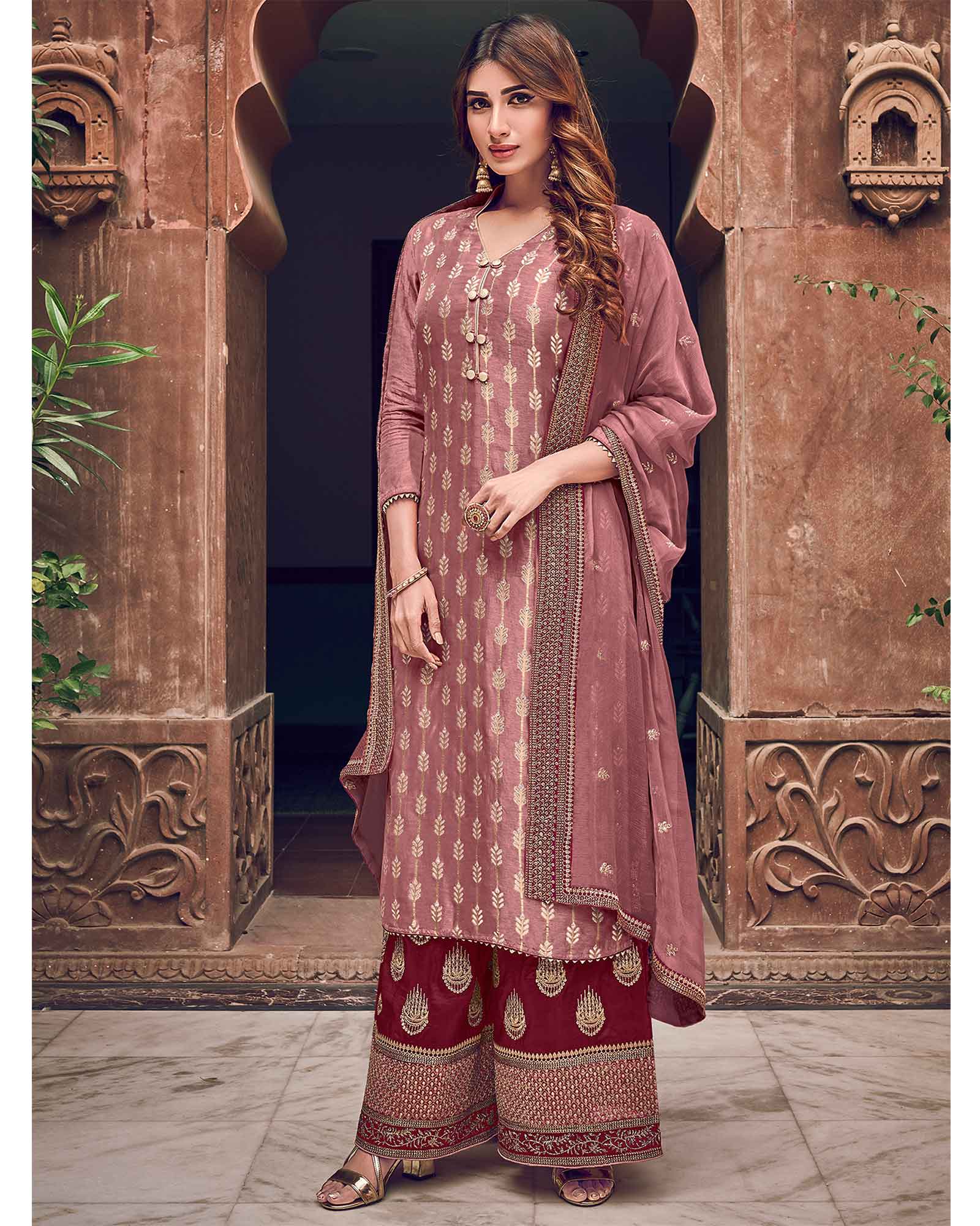 Pleasant Pink Colored Partywear Embroidered Dress Material