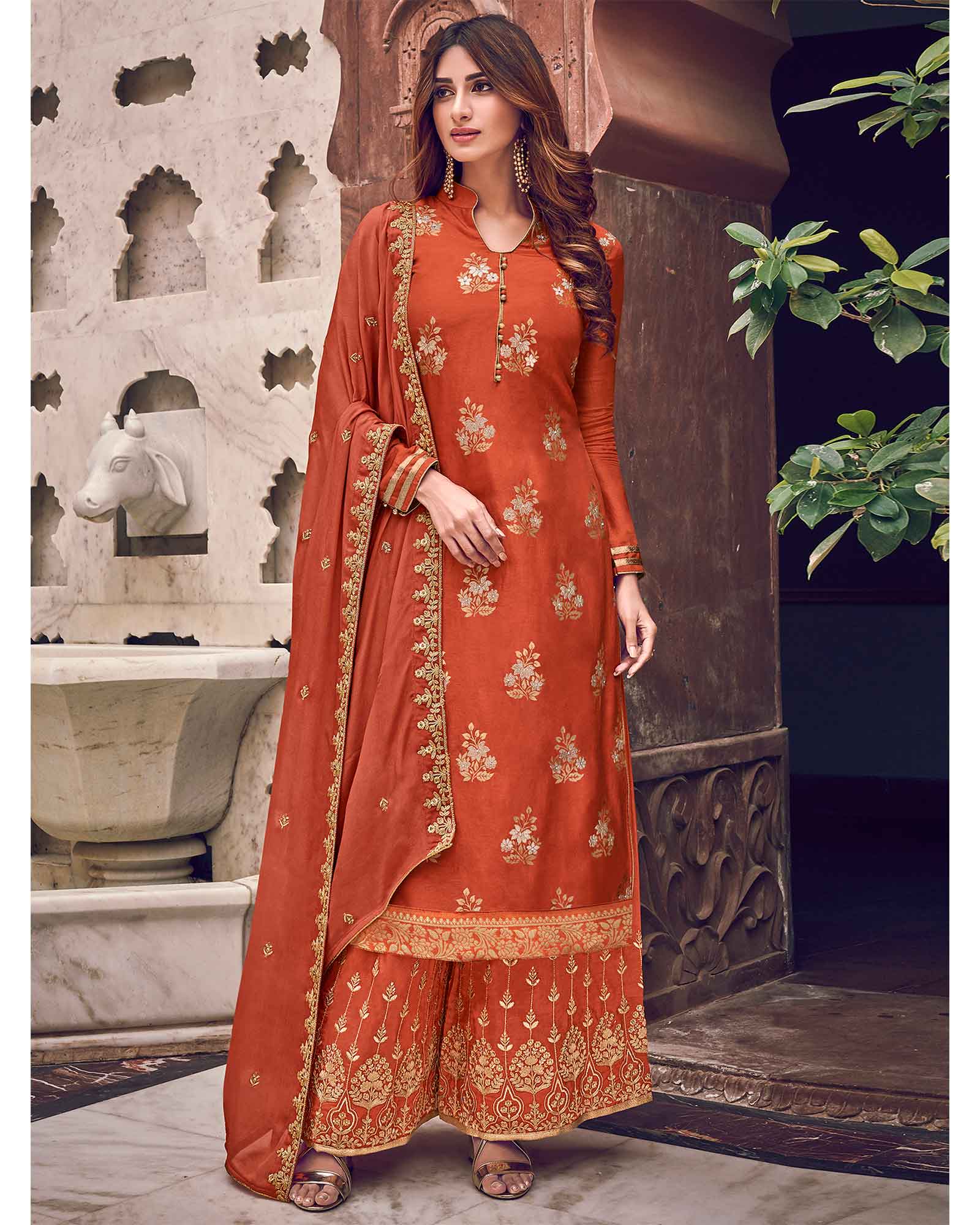 Ravishing Orange Colored Party Wear Embroidered Dress Material