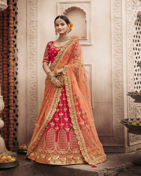 Punch Pink Silk Bridal Lehenga Choli With Heavy Thread Embroidery And Stone Work