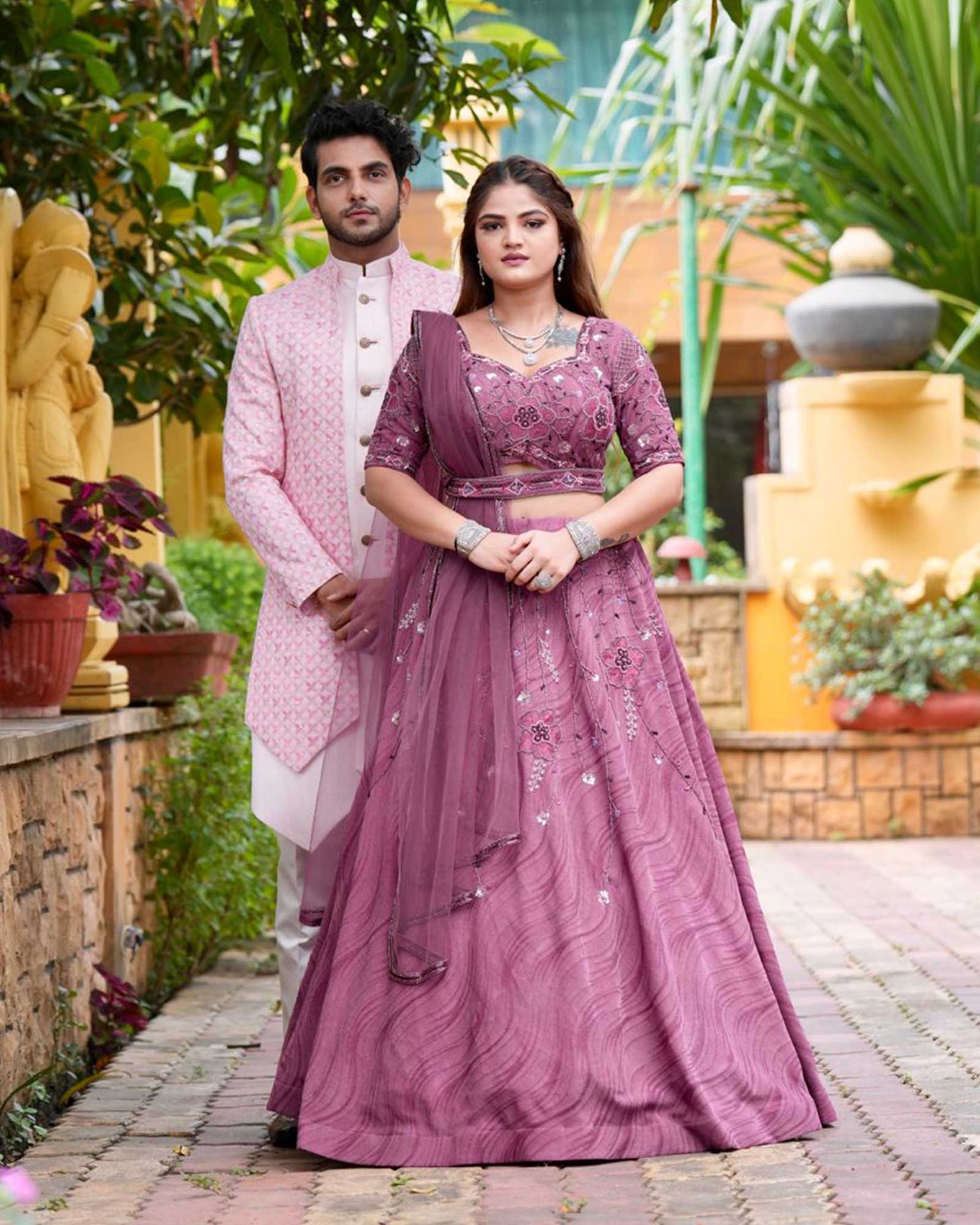 pretty-purple-wedding-wear-for-couple